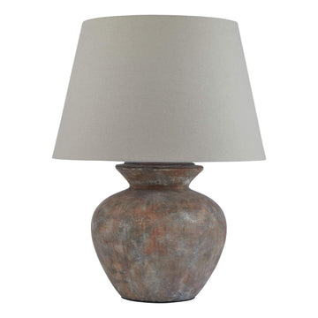 Rustic ceramic table lamp with weathered gray-brown finish and neutral beige fabric shade, 63cm tall.by Sostter at brixbailey.com