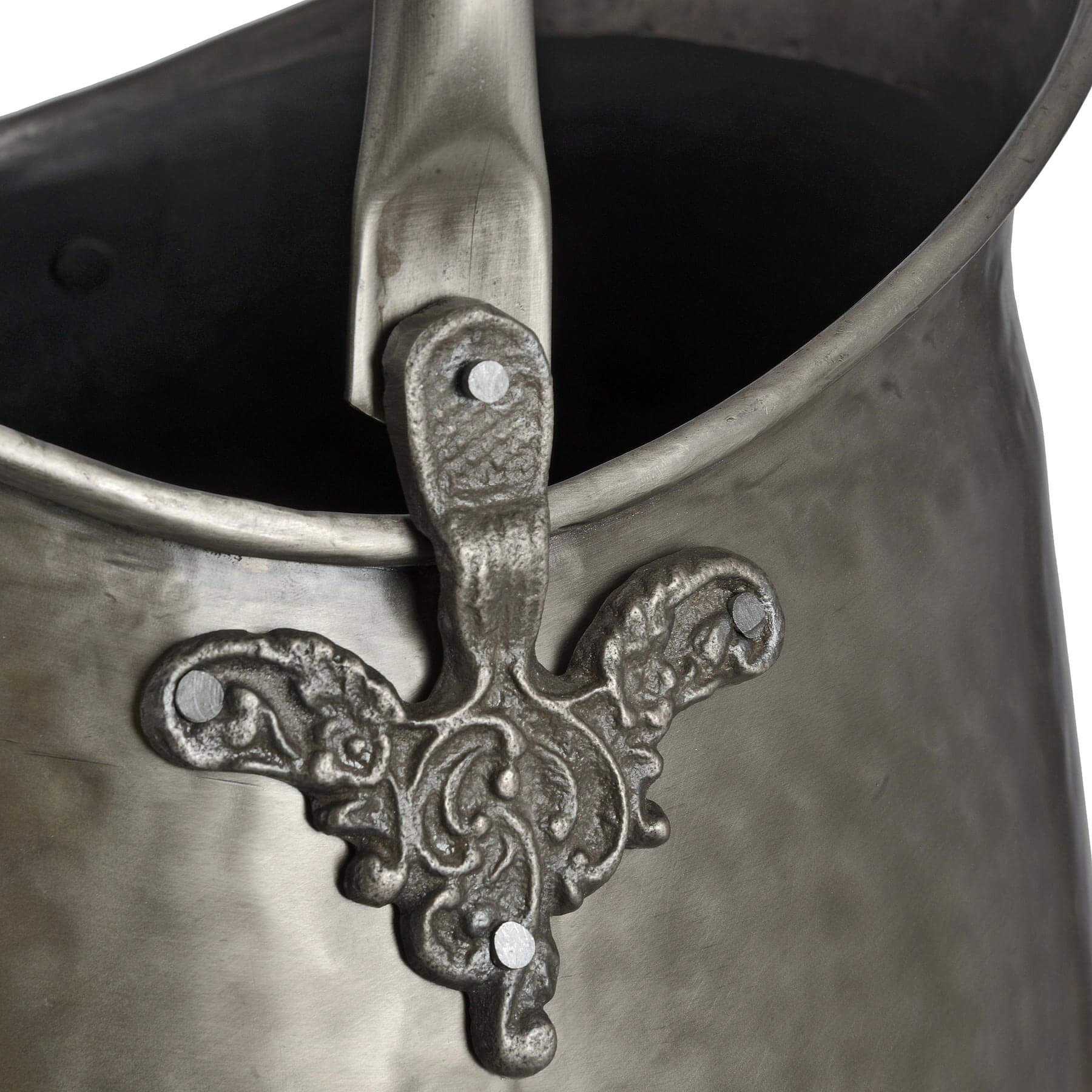 Handcrafted antique pewter coal bucket with gunmetal finish, intricate leaf motifs, and versatile design for home decor. by Sostter at brixbailey.com
