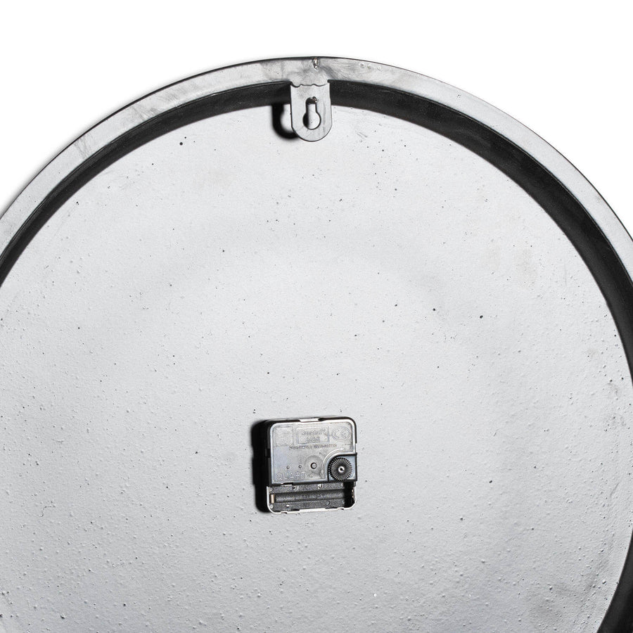 Large grey wall clock with white roman numerals, minimalist modern design, 49cm diameter, metal frame by Sostter at brixbailey.com