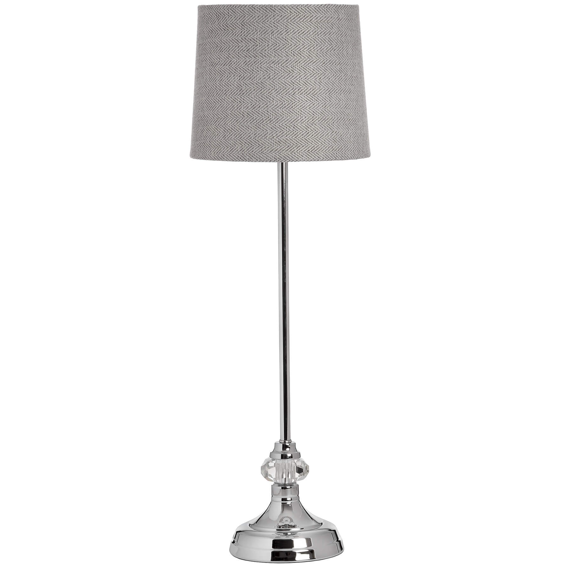 Silver designer table lamp with chrome base, glass accents, and herringbone fabric shade for warm, elegant lighting by Sostter at brixbailey.com