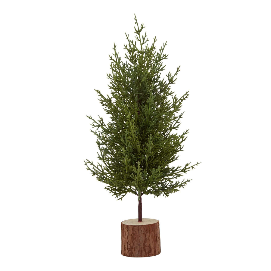 Miniature evergreen tree with lifelike green foliage on rustic wood log base, perfect for holiday decor centerpiece. by Sostter at brixbailey.com