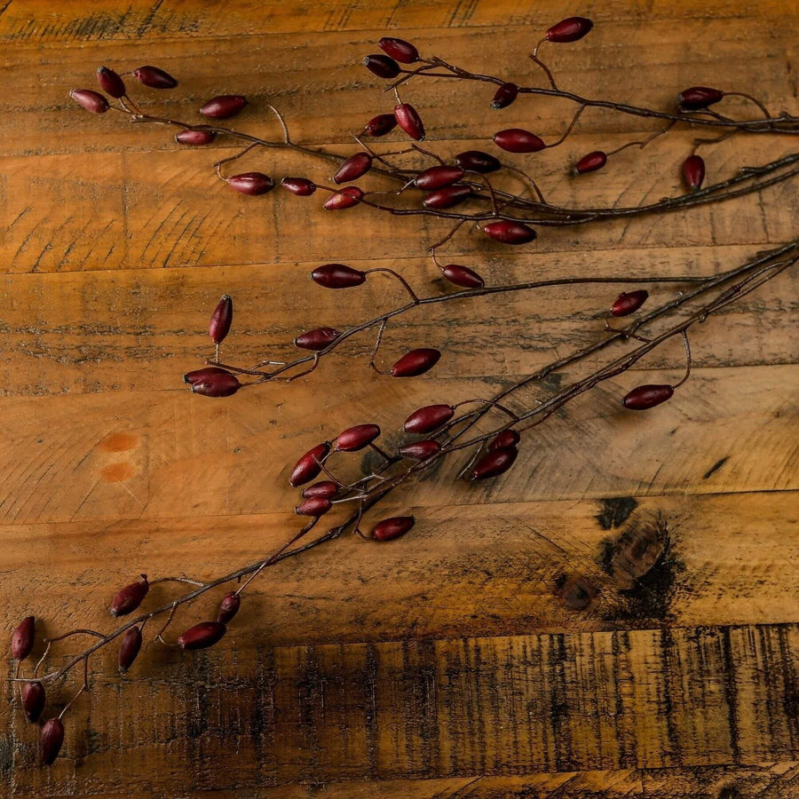 Burgundy rosehip stem with lifelike plastic petals, 42.5 inches tall, for elegant home decor centerpieces by Sostter at brixbailey.com