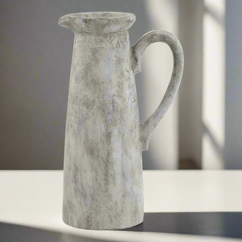 Athena white ceramic pitcher with sculptural silhouette, perfect for floral arrangements or as a water pitcher by Sostter at brixbailey.com