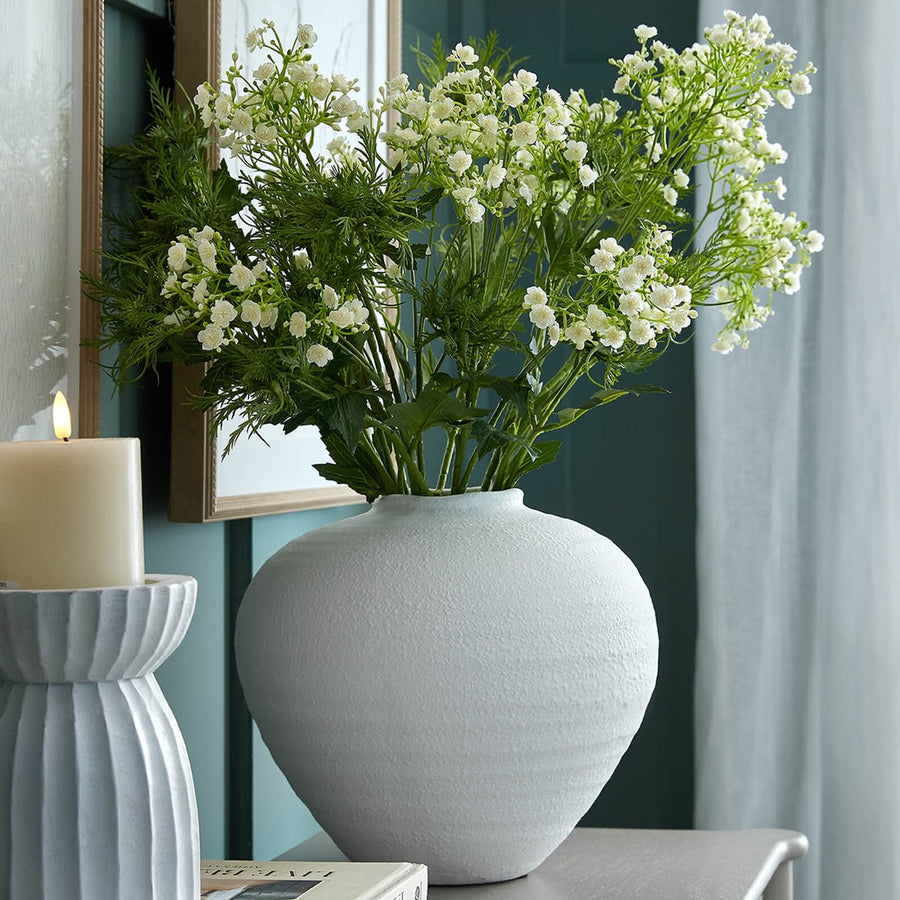 Matte white ceramic vase with clean lines, 35cm sculptural silhouette, perfect for floral arrangements and modern decor. by Sostter at brixbailey.com