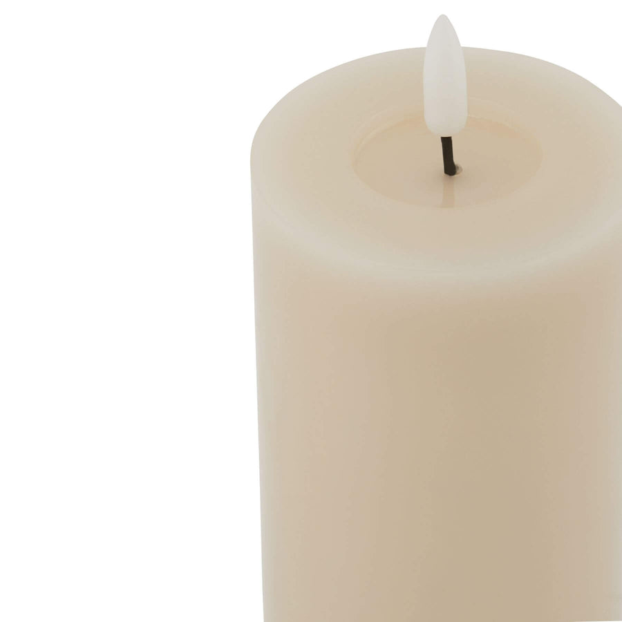Taupe LED wax candle with realistic drips, flame-free flickering glow for home decor ambiance  by Sostter at brixbailey.com