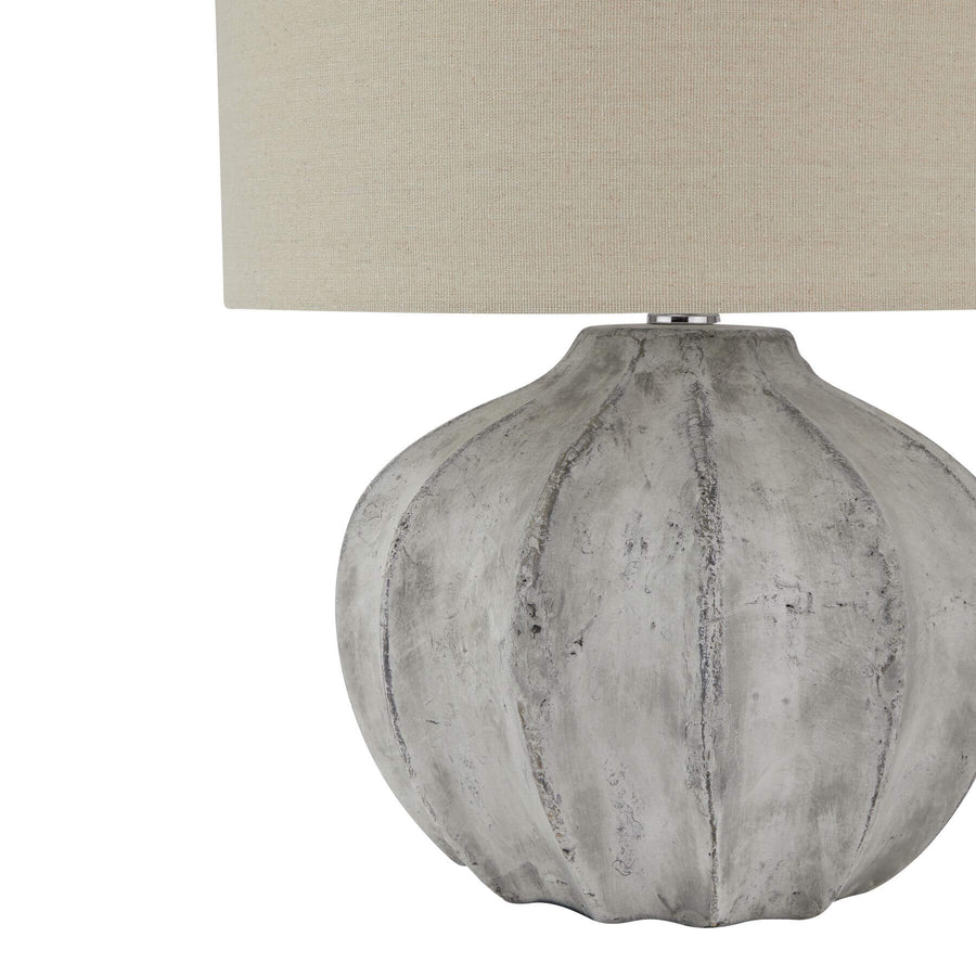 Handcrafted concrete table lamp with ribbed base and beige fabric shade, natural stone gray, farmhouse-industrial decor by Sostter at brixbailey.com