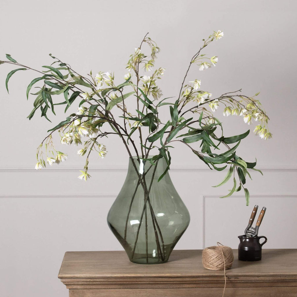 Handcrafted sage green glass vase with minimalist design, matte finish, and modern platform silhouette for home decor. by Sostter at brixbailey.com