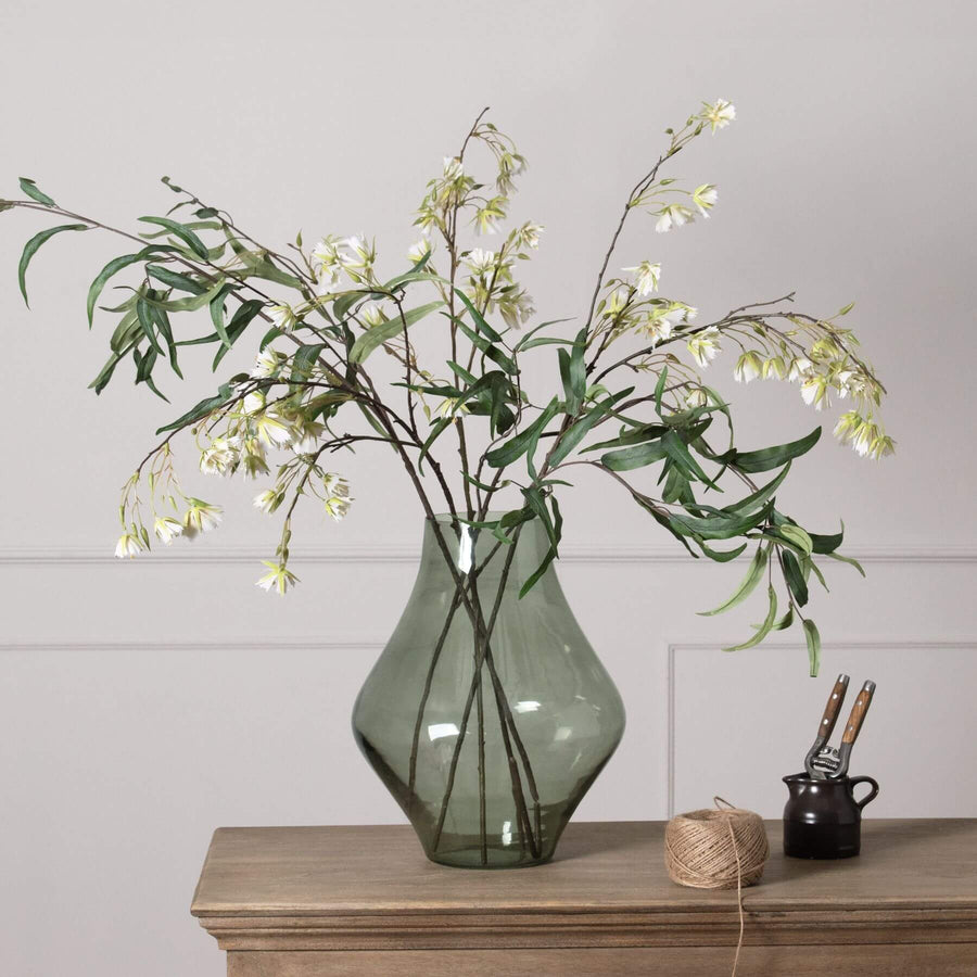 Handcrafted sage green glass vase with minimalist design, matte finish, and modern platform silhouette for home decor. by Sostter at brixbailey.com