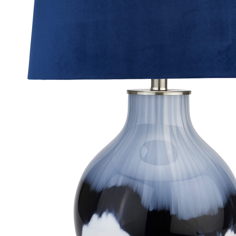 Handcrafted Ice Shadows table lamp with blue and white glaze, navy velvet shade, and elegant ball finial. by Sostter at brixbailey.com