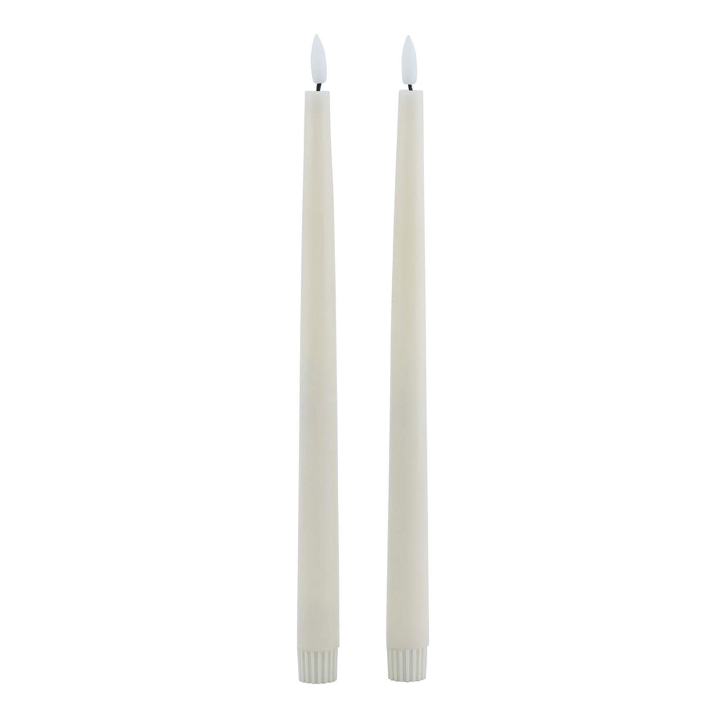 Realistic taupe LED wax candles with melt effect, flame-free and battery-operated, set of two for home decor by RoomLondon at brixbailey.com