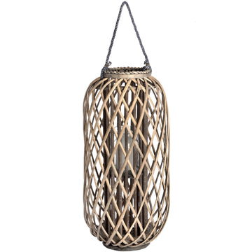 Handwoven rattan lantern with intricate natural weave, rich brown, creates warm light patterns for indoor or outdoor decor. by Sostter at brixbailey.com