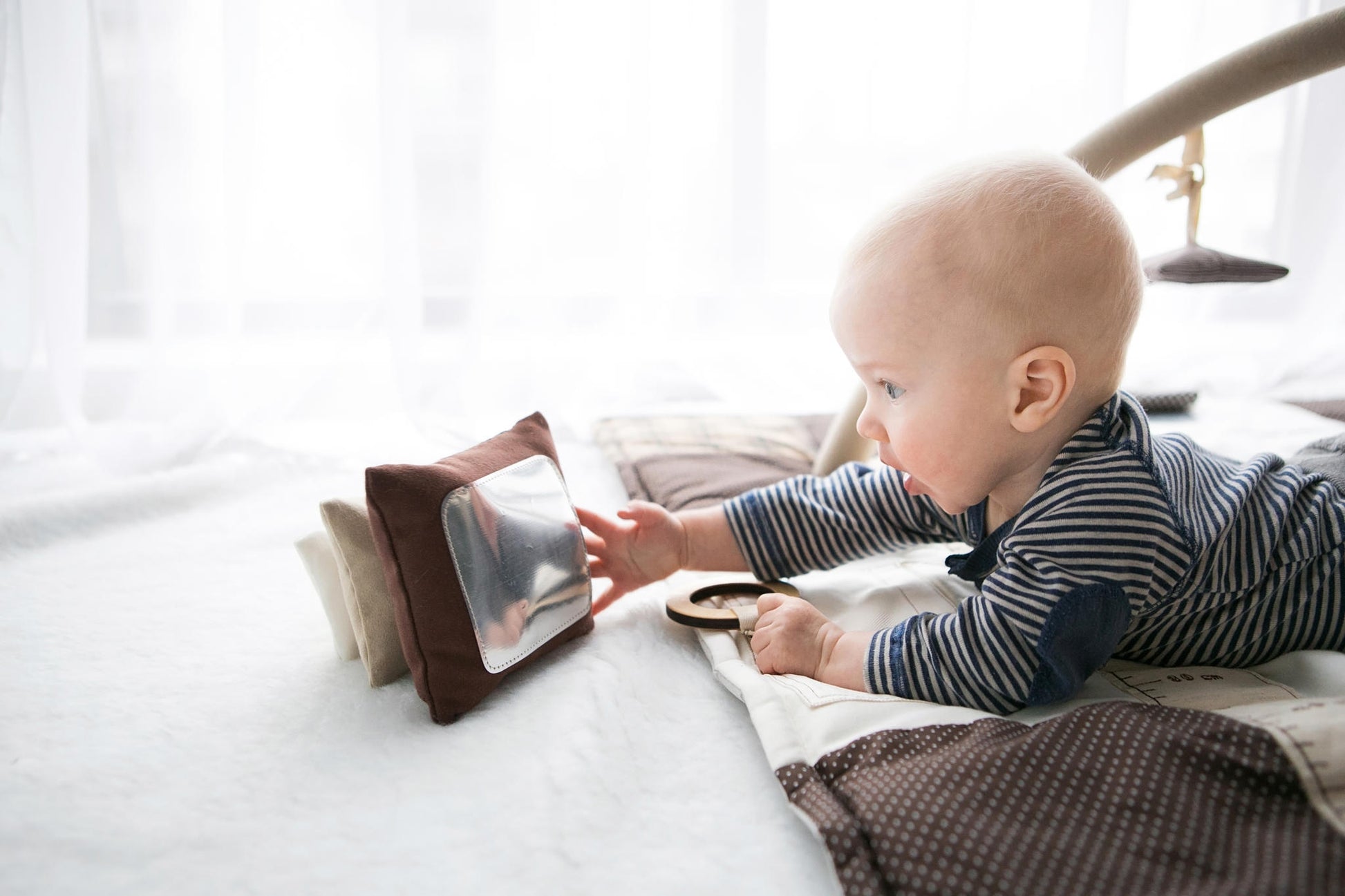 Karloova Pillow Heap – Handmade Baby Toy with Sensory Features by Karloova at www.brixbailey.com