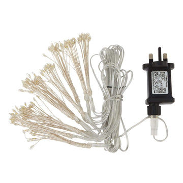 Warm white starburst LED lights with 200 glowing bulbs on sleek silver cables, modern decor lighting. by Hill Interiors at brixbailey.com
