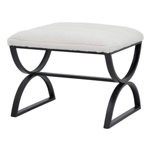 Cream ribbed boucle footstool with black curved metal legs, plush textured upholstery, modern accent piece. by sostter at brixbailey.com