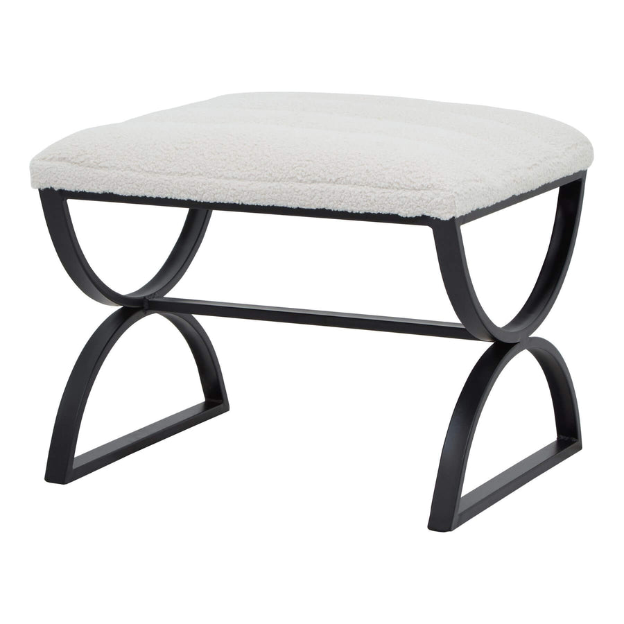 Cream ribbed boucle footstool with black curved metal legs, plush textured upholstery, modern accent piece. by Sostter at brixbailey.com