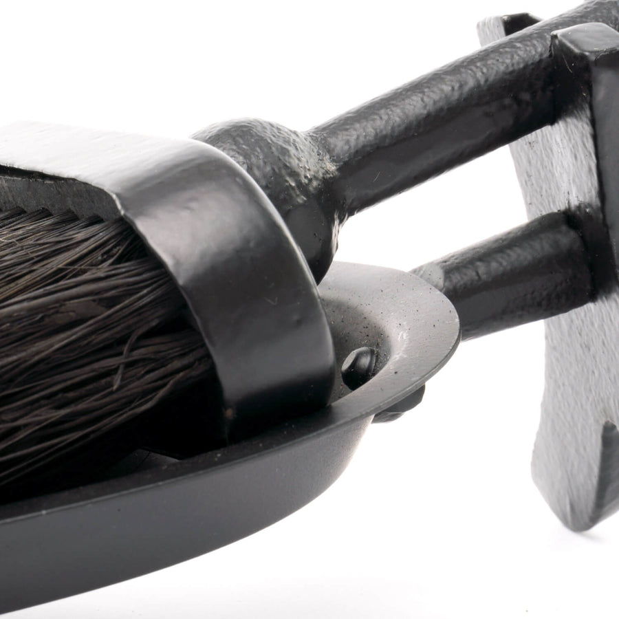 Black Crook Handled Hearth Tidy with sleek metal finish, ergonomic design for fireplace tools by Sostter at brixbailey.com