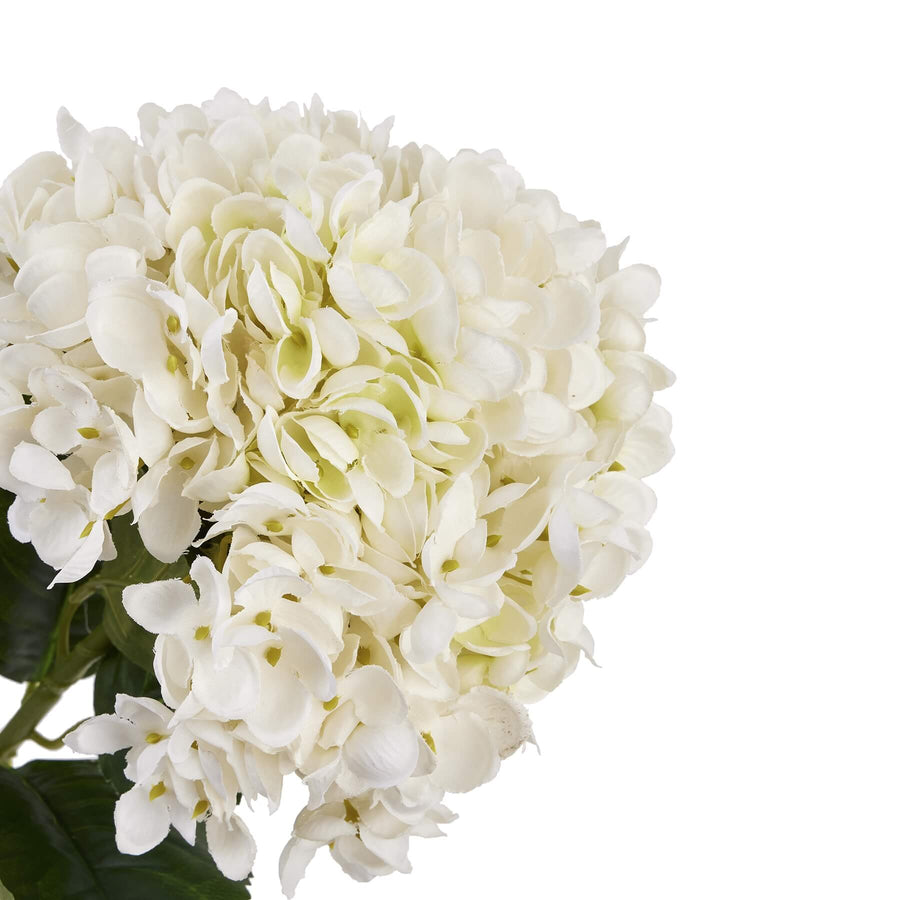 White artificial hydrangea stem with realistic clustered florets and green stem, 58cm tall by Sostter at brixbailey.com