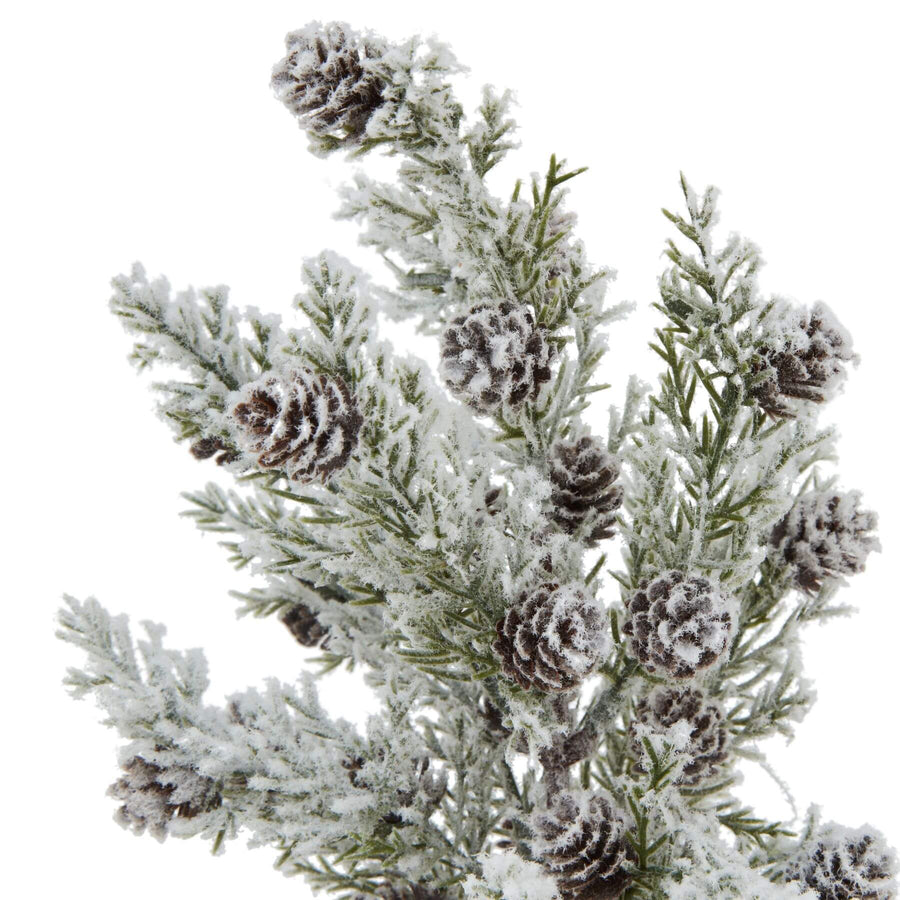 Miniature snow-dusted fir tree with pinecones on rustic wood base, perfect for winter decor by Sostter at brixbailey.com
