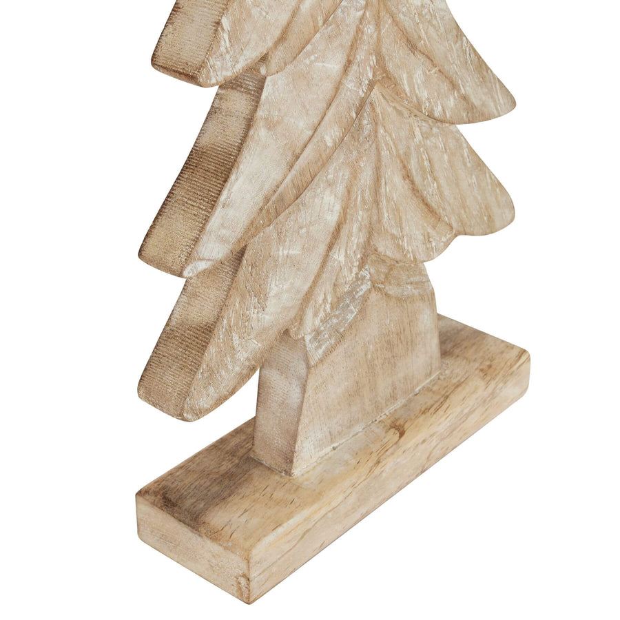 Handcrafted rustic wooden holiday trees with intricate carvings in rich brown tones, perfect for seasonal decor. by Sostter at brixbailey.com