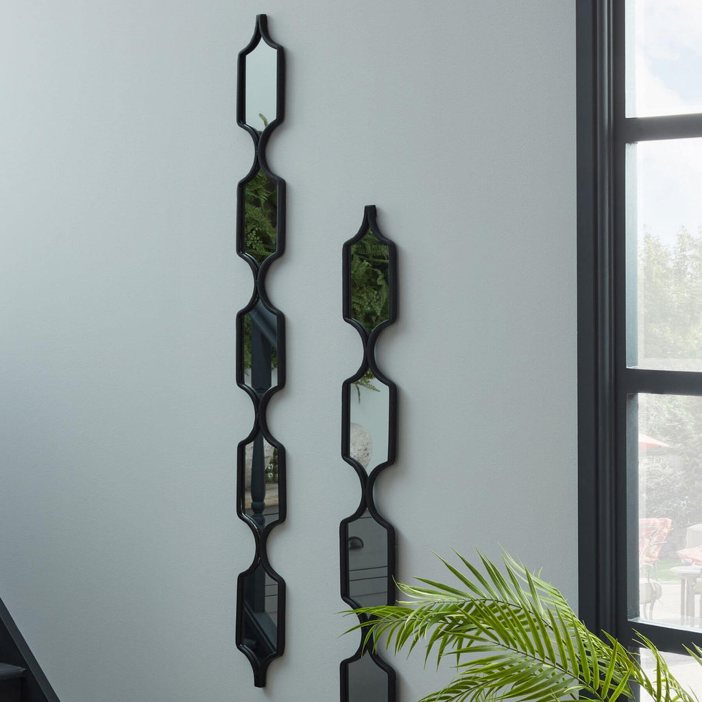 Sleek black hanging mirror with matte metal frame, minimalist rectangular design for modern home decor by RoomLondon at brixbailey.com