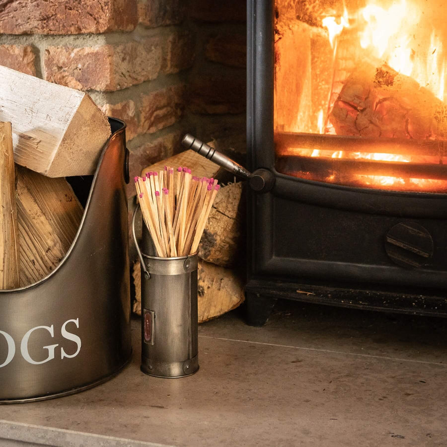 Antique pewter match holder with wood accents, classic silver finish, and integrated striker for fireplace essentials. by Sostter at brixbailey.com