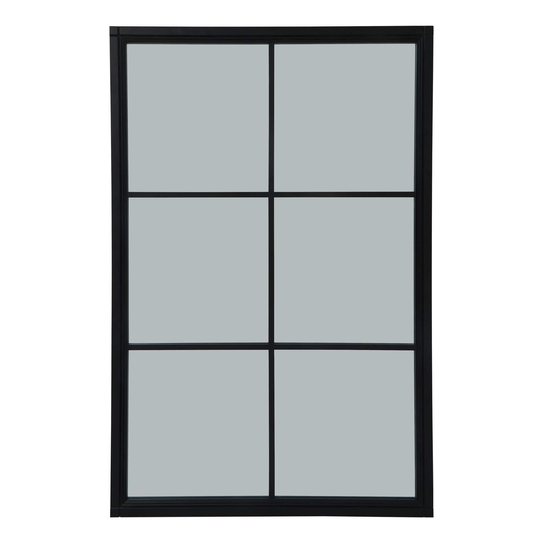 Oversized Georgian-style window mirror with ebony wood frame and grid detailing, enhancing light and space by Sostter at brixbailey.com