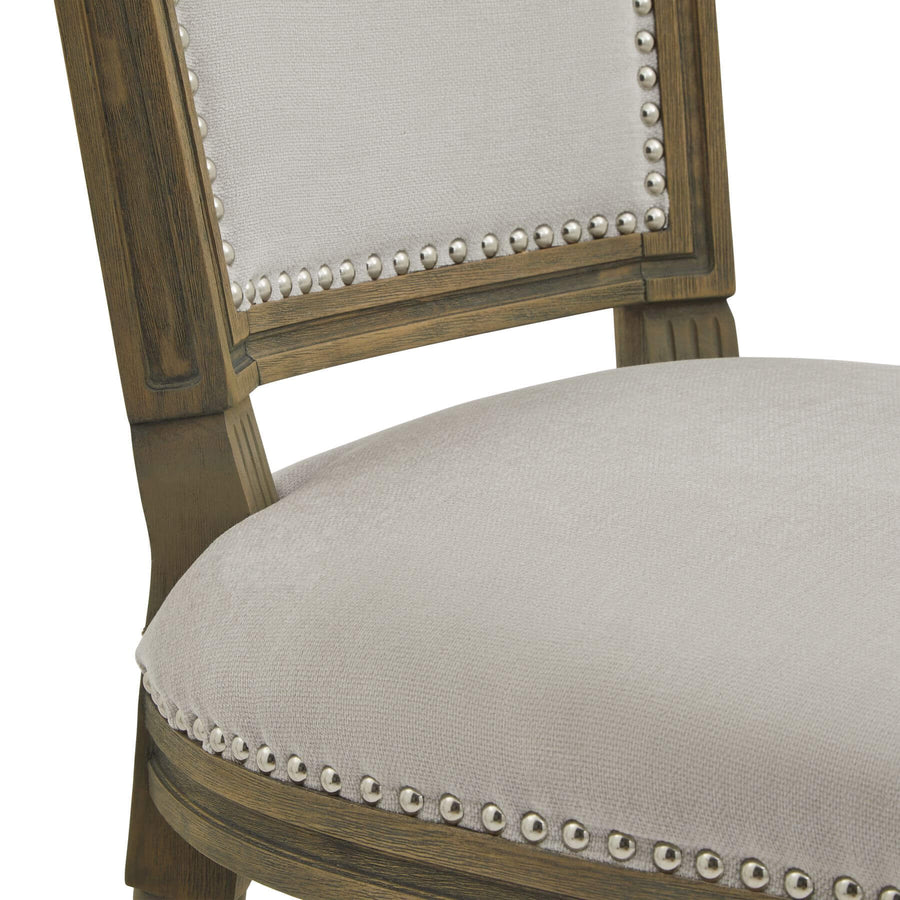 Ripley grey dining chair with rubberwood frame and woven upholstery, handcarved details, ergonomic design by Sostter at brixbailey.com