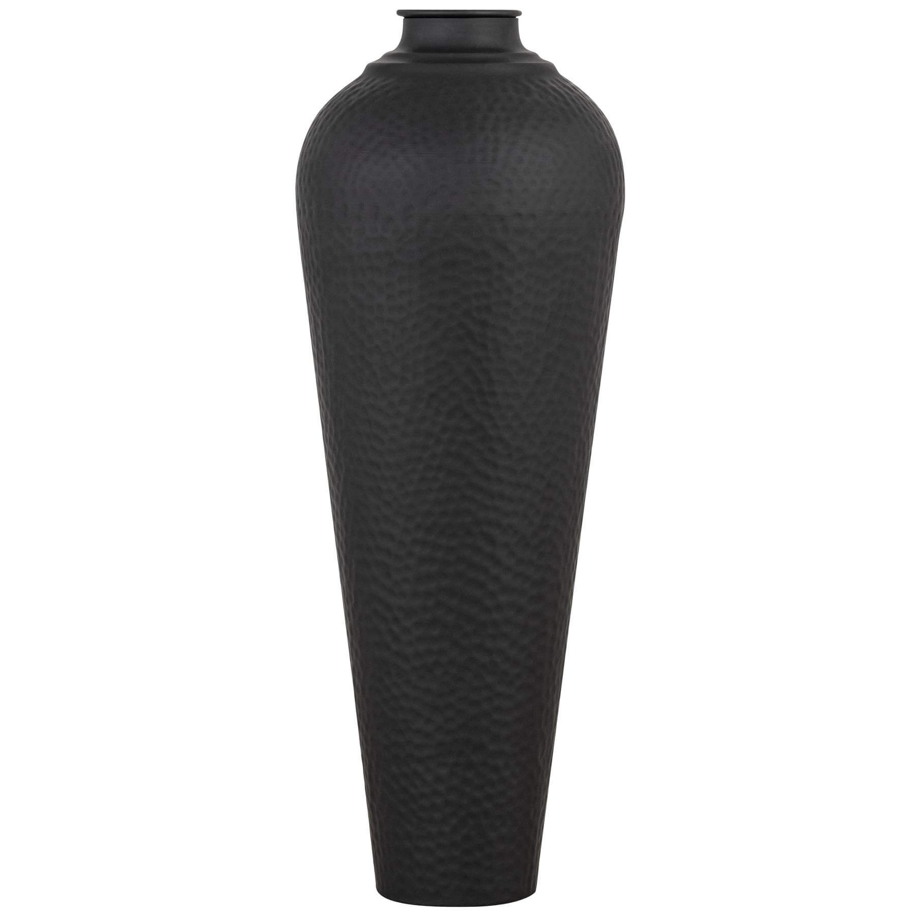Matt black hammered steel vase, artisan-crafted with textured finish, modern floor decor for floral displays. by Sostter at brixbailey.com