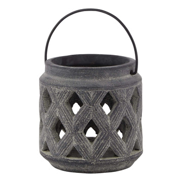 Grey ceramic lattice lantern with geometric Mediterranean patterns, casting intricate shadows when lit. by Hill Interiors at brixbailey.com