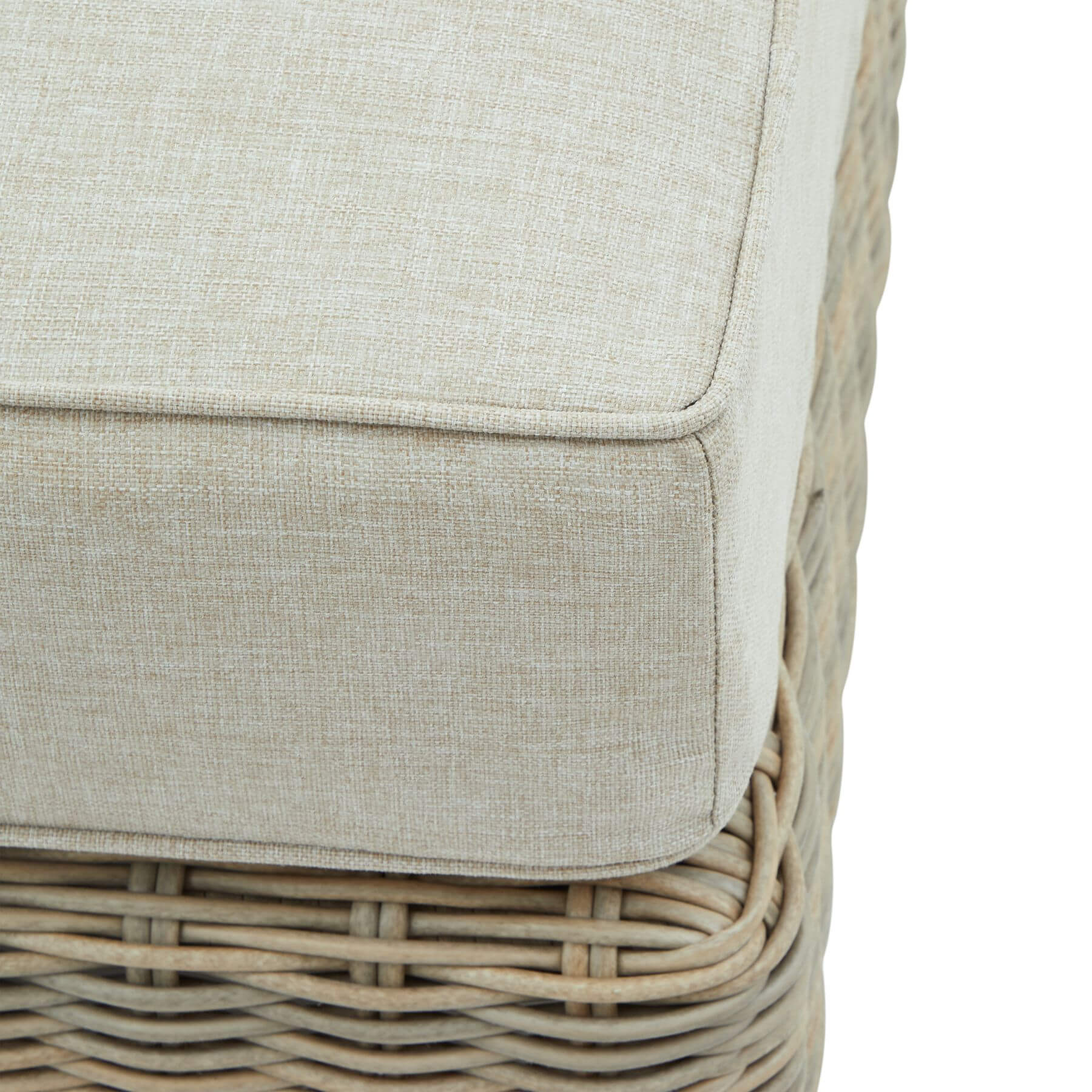Beige HDPE wicker footstool with Olefin cushion and acacia wood feet for outdoor patio or garden by Sostter at brixbailey.com