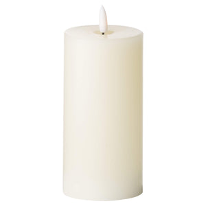 Warm ivory LED flameless candle with realistic flicker, durable plastic, 15cm tall, creates cozy ambiance without flames (124 chars) by sostter at brixbailey.com