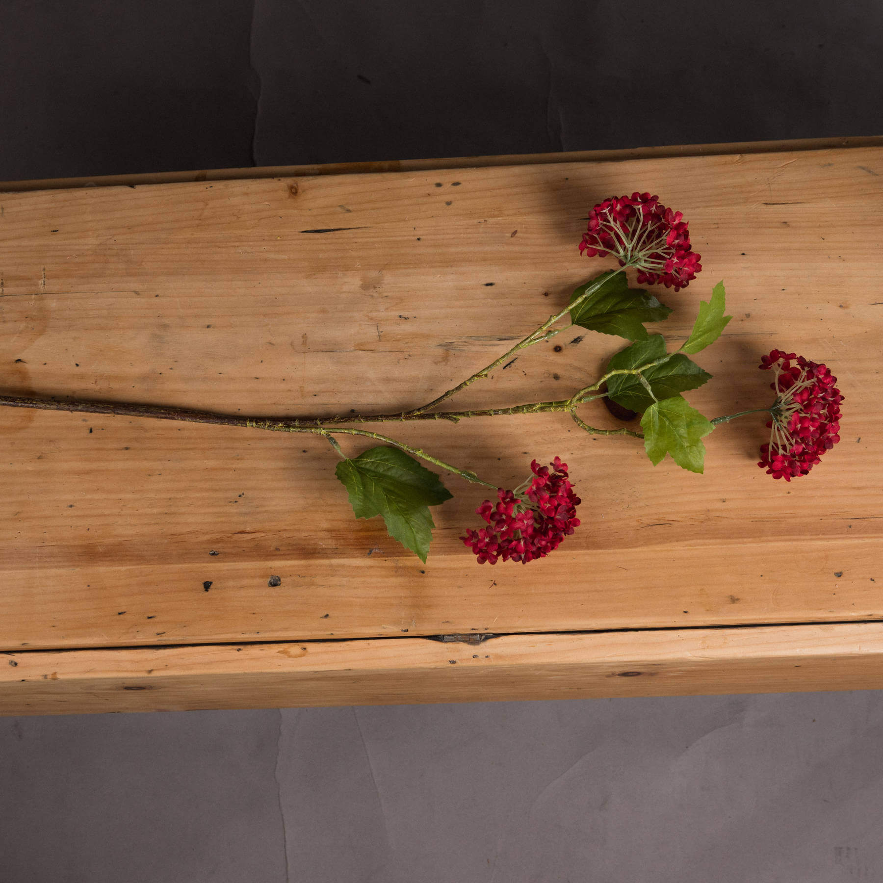 Lifelike artificial viburnum stem with deep crimson berries for autumn floral arrangements by Sostter at brixbailey.com