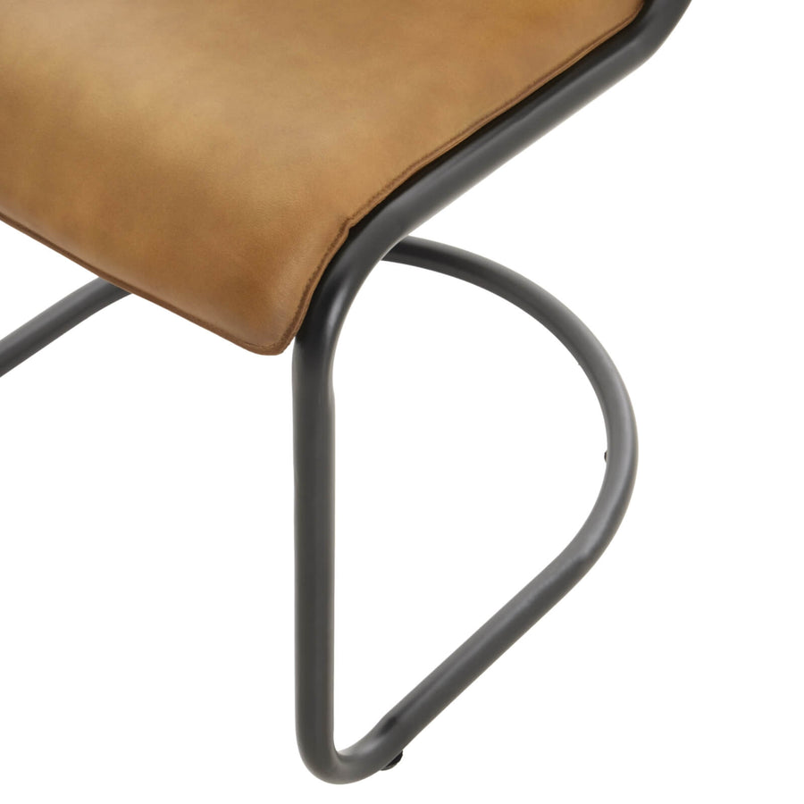 Billy leather dining chair in rich brown with curved ergonomic design and sturdy metal frame by Sostter at brixbailey.com
