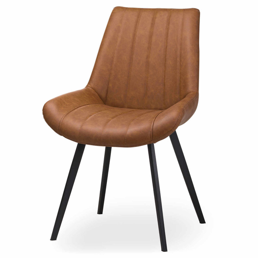 Modern Scandinavian dining chair in warm brown faux leather with black metal legs, minimalist design. by Sostter at brixbailey.com