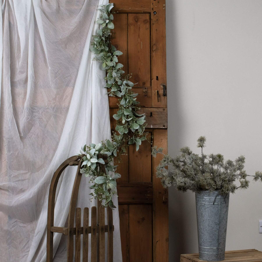 Elegant winter garland with lamb's ear foliage and wax flowers in soft grey and green tones, 153cm long by Sostter at brixbailey.com