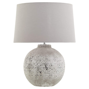Tiber large stone ceramic lamp with grey fabric shade, artisan speckled texture, and E14 bulb compatibility for ambient lighting. by Sostter at brixbailey.com