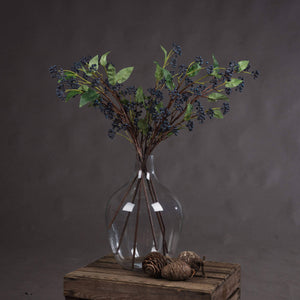 Handcrafted indigo berry stems with deep blue hues, flexible wired branches, and realistic texture for floral arrangements. by sostter at brixbailey.com