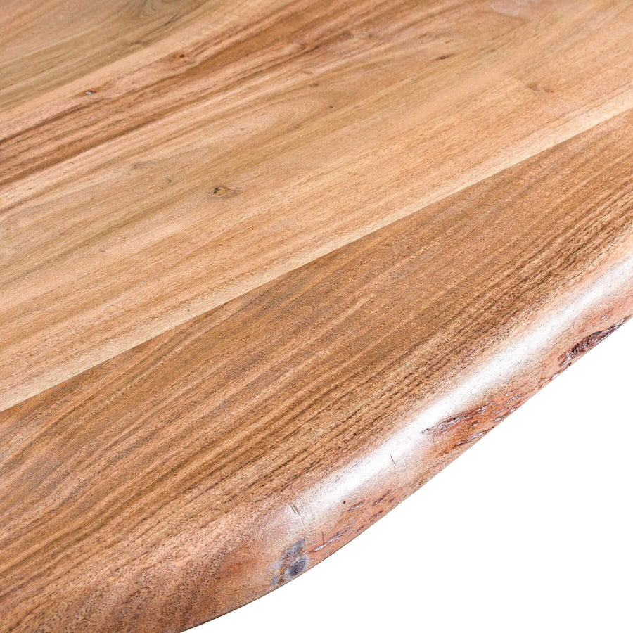 Handcrafted acacia wood dining table with live edge and metal cross-frame base, seats 8, natural brown with grey accents. by Sostter at brixbailey.com