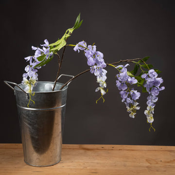 Lifelike artificial lilac wisteria blooms in cascading clusters, soft purple gradient petals, for home decor. by Sostter at brixbailey.com