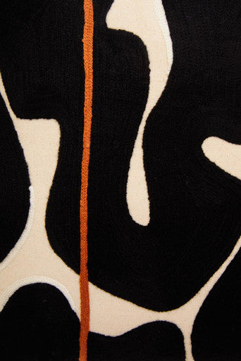 Black and Beige Embroidered Cushion with Orange Accent