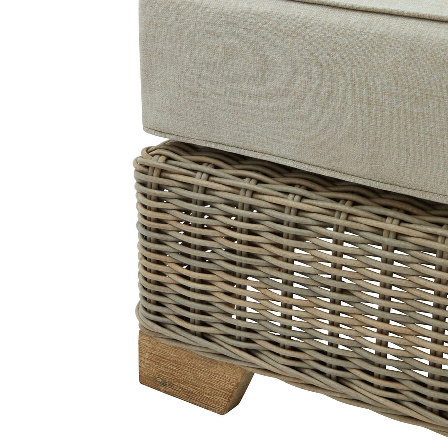 Beige HDPE wicker footstool with Olefin cushion and acacia wood feet for outdoor patio or garden by Sostter at brixbailey.com