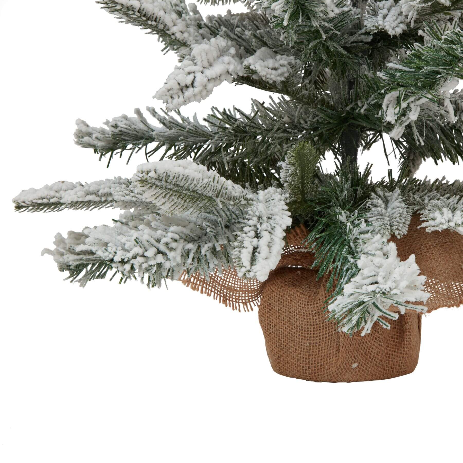 Medium snowy spruce tree with frosted white branches and rustic burlap base for winter decor  by Sostter at brixbailey.com
