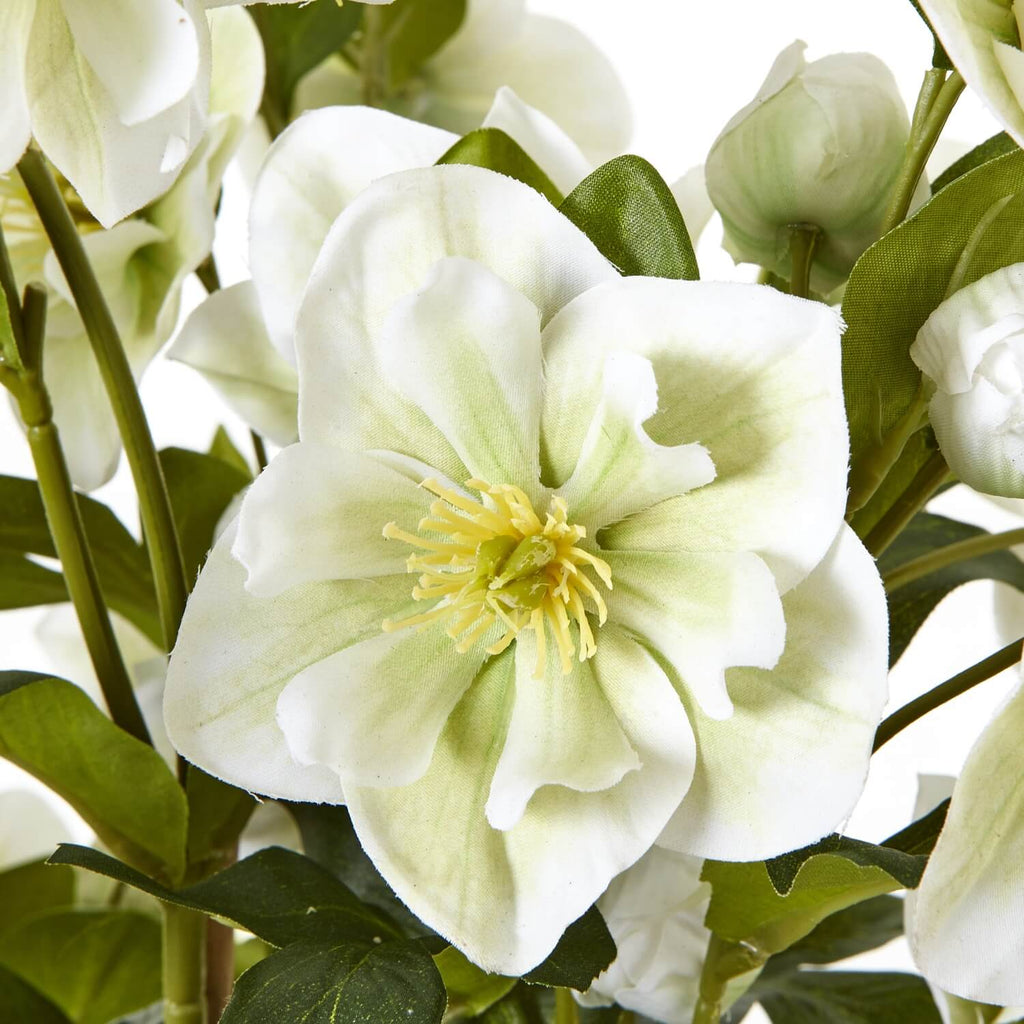 White faux hellebore floral arrangement in grey planter, lifelike plastic blooms with green stems, home decor centerpiece by Sostter at brixbailey.com