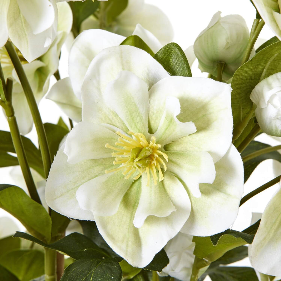 White faux hellebore floral arrangement in grey planter, lifelike plastic blooms with green stems, home decor centerpiece by Sostter at brixbailey.com