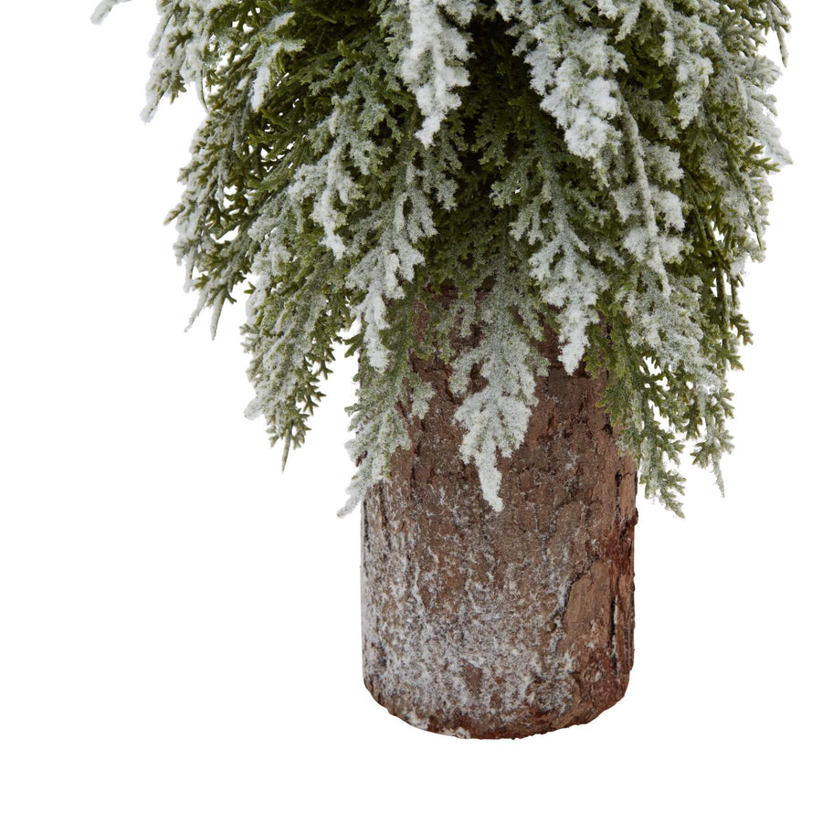 Snow-dusted fir tree on natural wood log base, 30cm winter decor with rustic charm and frosty elegance. by Sostter at brixbailey.com