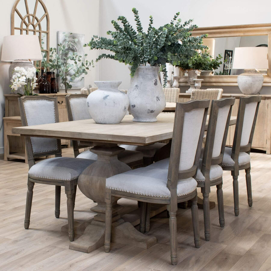 French-inspired hardwood dining table with bleached finish and black iron accents, 200cm length. by Sostter at brixbailey.com