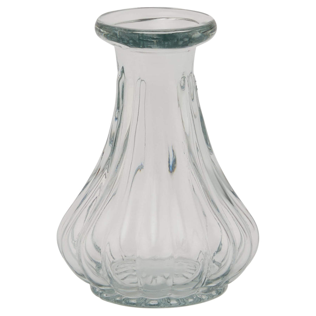 Minimalist clear glass bud vase, 9cm tall, showcasing elegant floral arrangement with modern design by Sostter at brixbailey.com