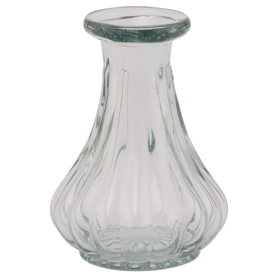 Minimalist clear glass bud vase, 9cm tall, showcasing elegant floral arrangement with modern design by Sostter at brixbailey.com