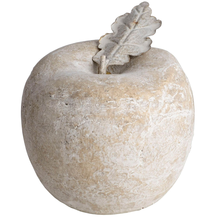 Handcrafted stone apple decor with antiqued finish, warm cream color, lifelike details for farmhouse or modern interiors. by Sostter at brixbailey.com