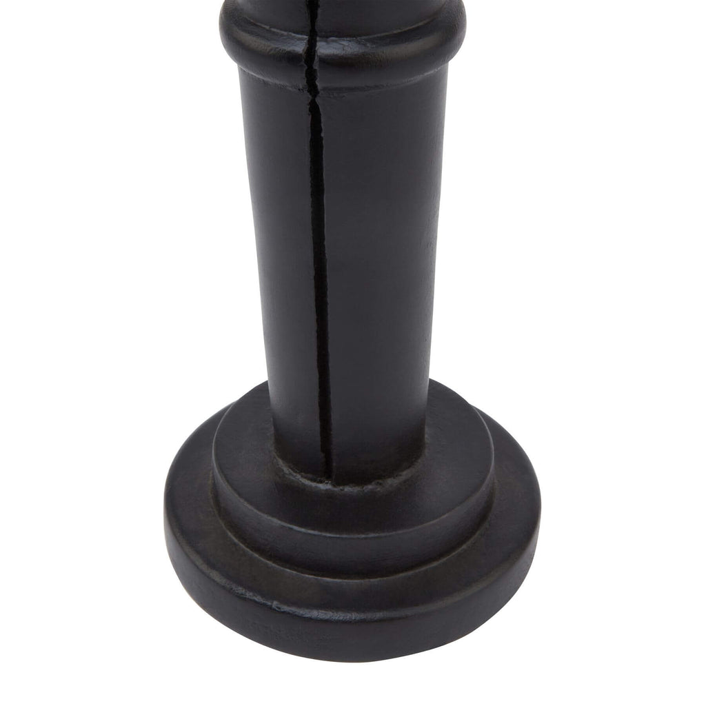 Black Scandinavian nutcracker with minimalist design, 60cm tall, matte wood finish for modern Christmas decor. by Sostter at brixbailey.com